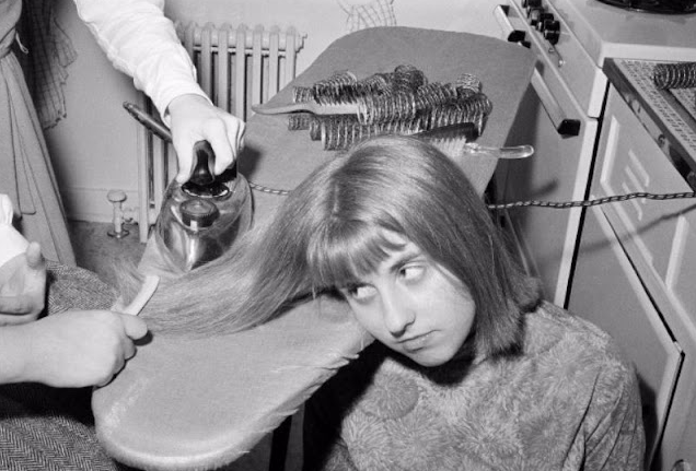 Teenage Girls Iron Their Hair Before a Night Out in New York City, 1964_lag