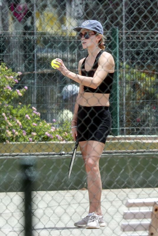 EMMA WATSON Playing Tennis on Vacation in Ibiza