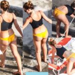 Sophisticated Sunbathing: Emma Watson Stuns in Black Bralette and Yellow Bikini Bottoms During Italian Getaway