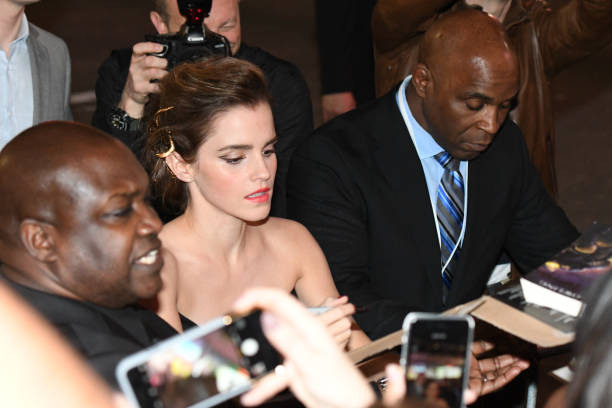 Moments of loving fans: Emma Watson is seen signing autographs for fans as she arrives at the premiere of “Beauty and the Beast”