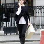 Enchanting Emma Watson Radiates Youthful Glow While Indulging in Retail Therapy in Central London.