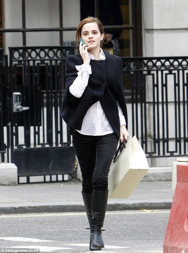 Enchanting Emma Watson Radiates Youthful Glow While Indulging in Retail Therapy in Central London.