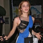 “Emma Watson Rocks Bold Net Outfit with Confidence”