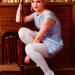 Emma Watson’s perfect outfit: Her hair up, the red lipstick and oh, the white tights with that dress