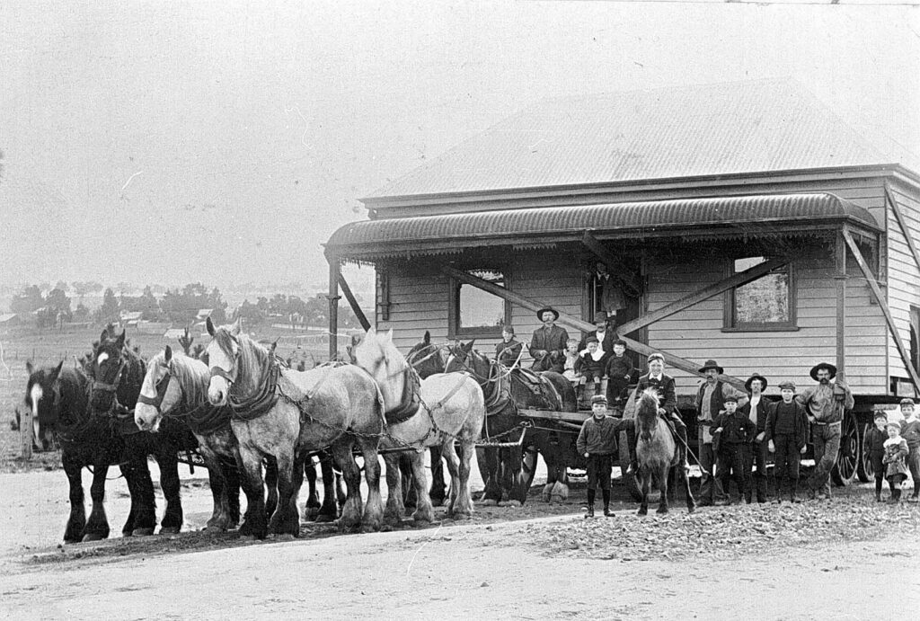 Moving entire houses by horses, 1890-1910