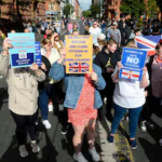 “Anti-Immigration Protests Heat Up in Belfast”_T