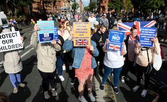 “Anti-Immigration Protests Heat Up in Belfast”_T